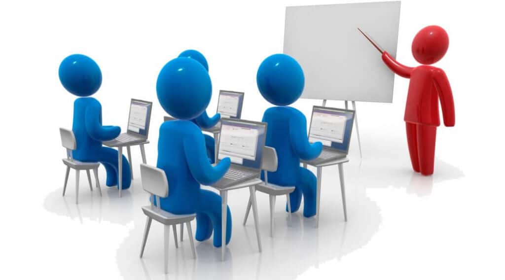 Manager formant une équipe dans le cadre d’une stratégie de nearshoring, pour garantir la qualité et la continuité des services externalisés